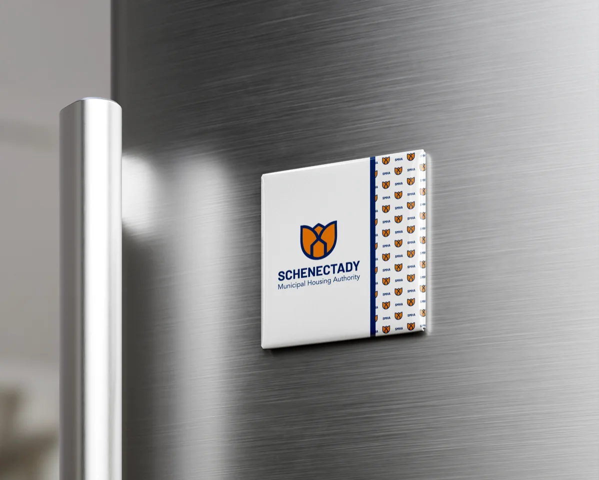 SMHA magnet on a refrigerator door